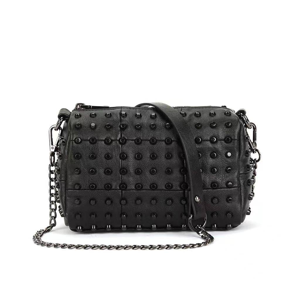 Women's studded satchel shoulder bag by Rossie Viren with a textured surface and silver-tone hardware.