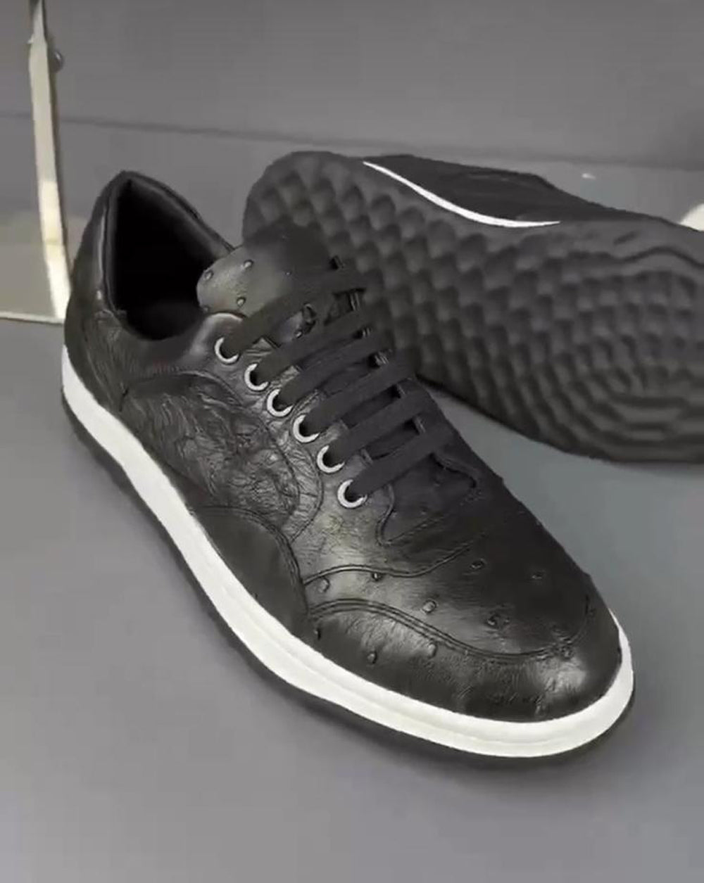 Rossie Viren ostrich skin leather sneaker showing sleek design and textured ostrich pattern on the shoes' upper.
