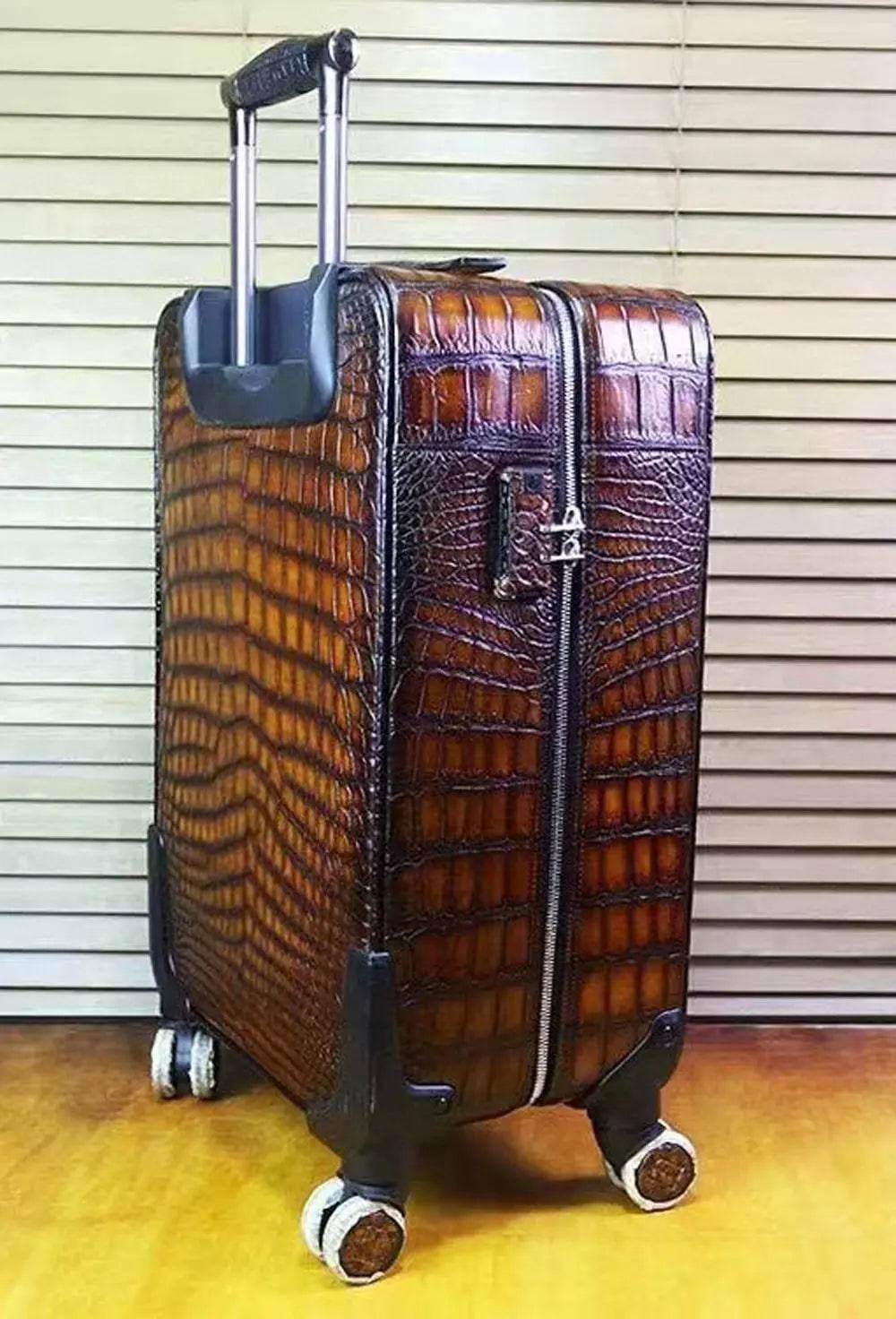Retro brown crocodile leather trolley suitcase with universal wheels, 20-inch travel bag and roll-aboard design by Rossie Viren.