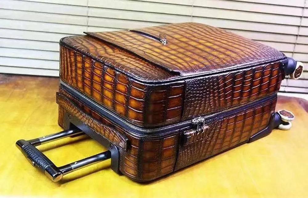 Retro brown crocodile leather trolley suitcase with universal wheels, 20-inch Roll Aboard travel bag by Rossie Viren.