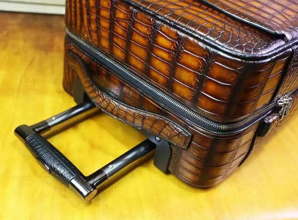 Retro brown crocodile leather suitcase with universal wheels, 20-inch rollaboard travel bag, Rossie Viren trolley case.