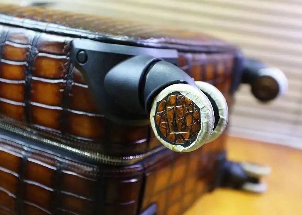 Retro brown crocodile leather suitcase by Rossie Viren with 20-inch trolley, universal wheels, ideal for weekend travel and travel bags.
