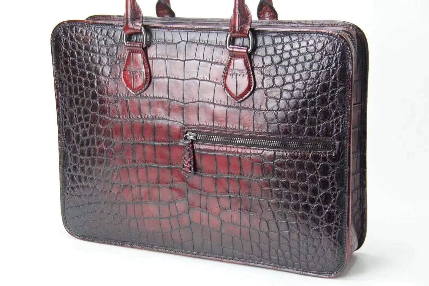 Retro crocodile leather crossbody handbag from Rossie Viren, featuring a stylish design and a laptop compartment for business use.
