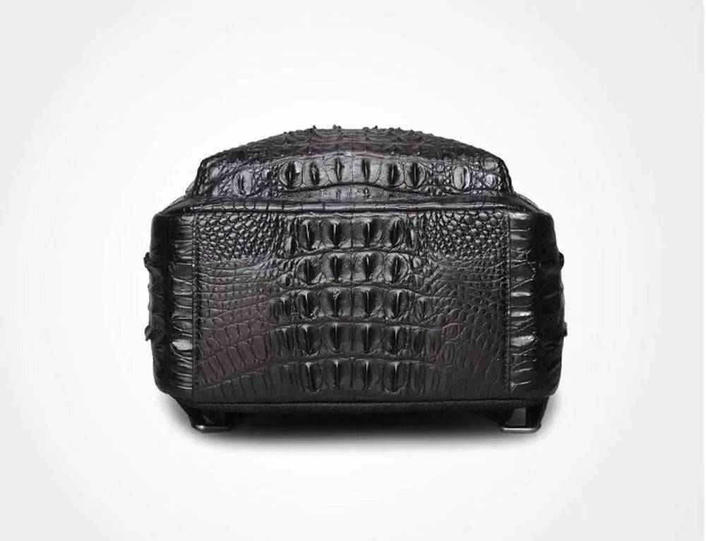 Rossie Viren unisex crocodile skin leather backpack featuring a structured handbag design with adjustable straps and top handle.