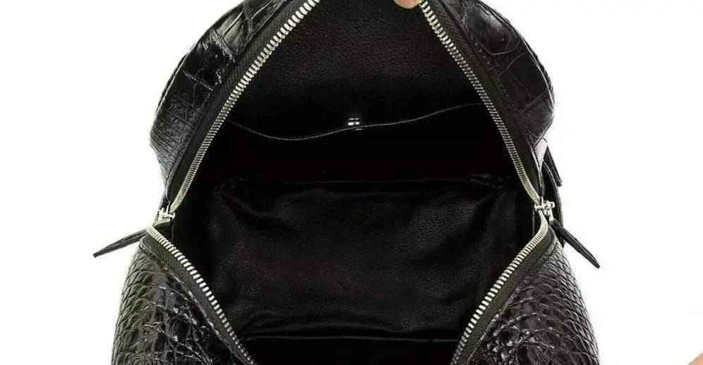 Rossie Viren unisex crocodile skin leather backpack with adjustable straps and multiple compartments, stylish and durable handbag.
