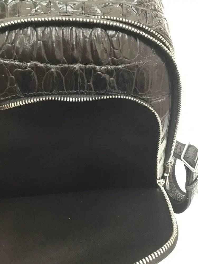 Rossie Viren crocodile skin leather backpack handbag with adjustable straps and sleek design for unisex use.