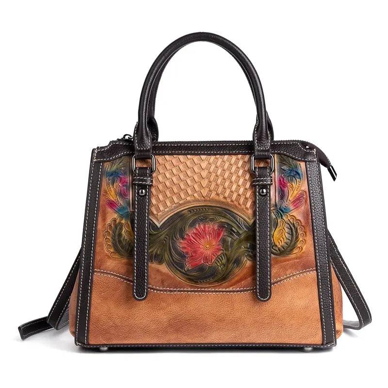 Rossie Viren women's leather handbag with top handle and crossbody strap, featuring a sleek design and structured silhouette.