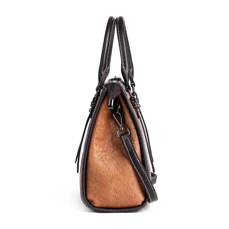 Rossie Viren women's leather handbag with top handle and crossbody strap, featuring a sleek design and elegant finish.