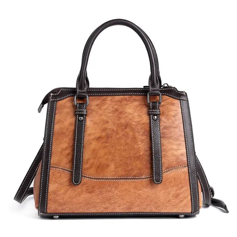 Rossie Viren women's leather handbag with top handle and crossbody strap, featuring a sleek shoulder bag design.