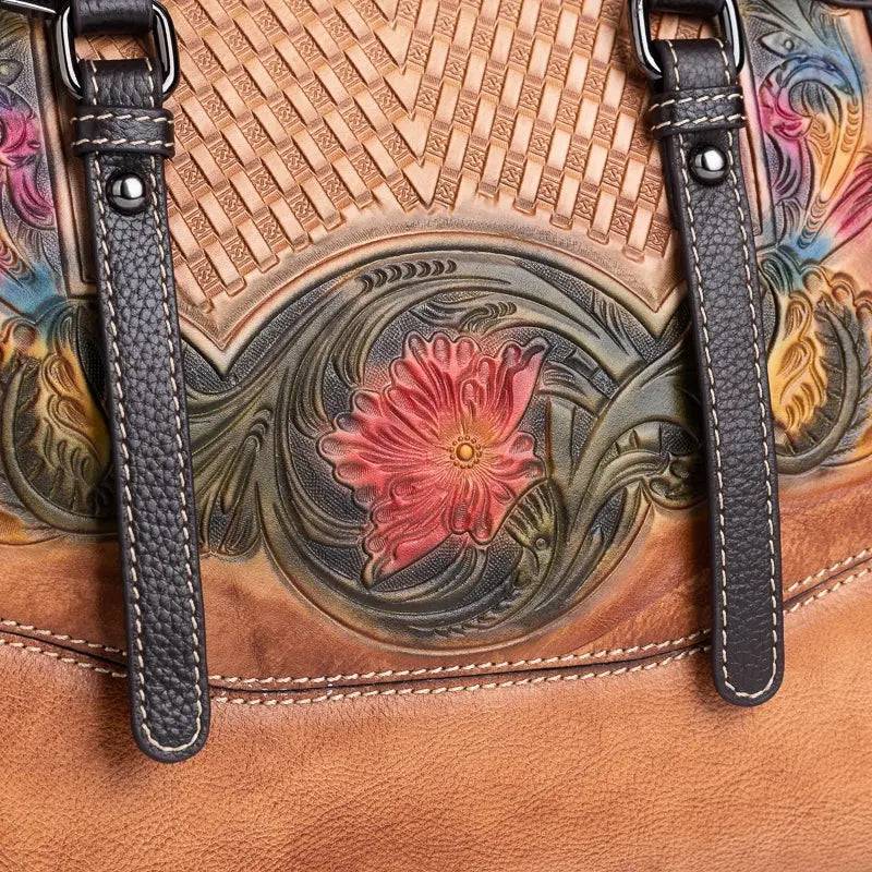 Rossie Viren women's leather handbag with top handle and crossbody strap, featuring a sleek shoulder bag design.