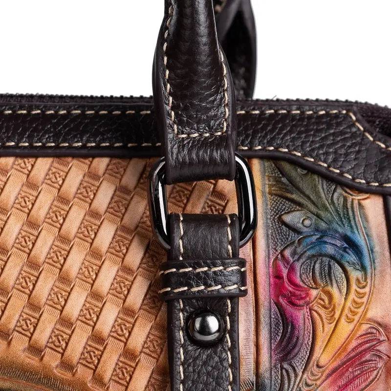 Rossie Viren women's leather handbag with top handle and crossbody strap, showcasing a stylish shoulder bag with sleek design.