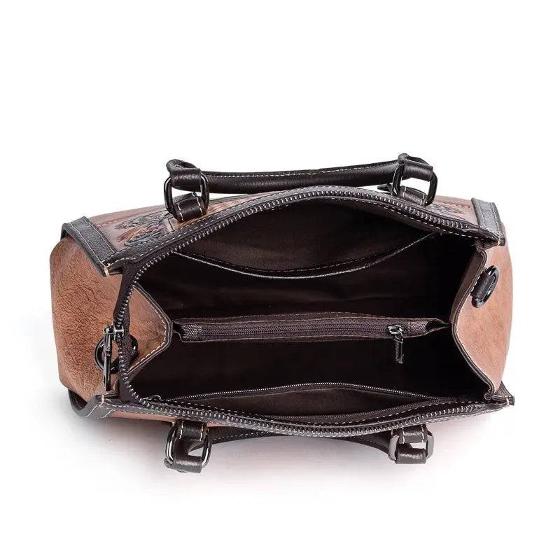 Rossie Viren women's leather top handle shoulder crossbody handbag with sleek design and sturdy strap.