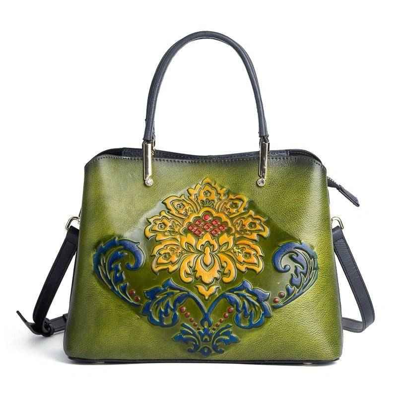 Rossie Viren women's leather handbag with top handle and shoulder strap, featuring a sleek crossbody design.