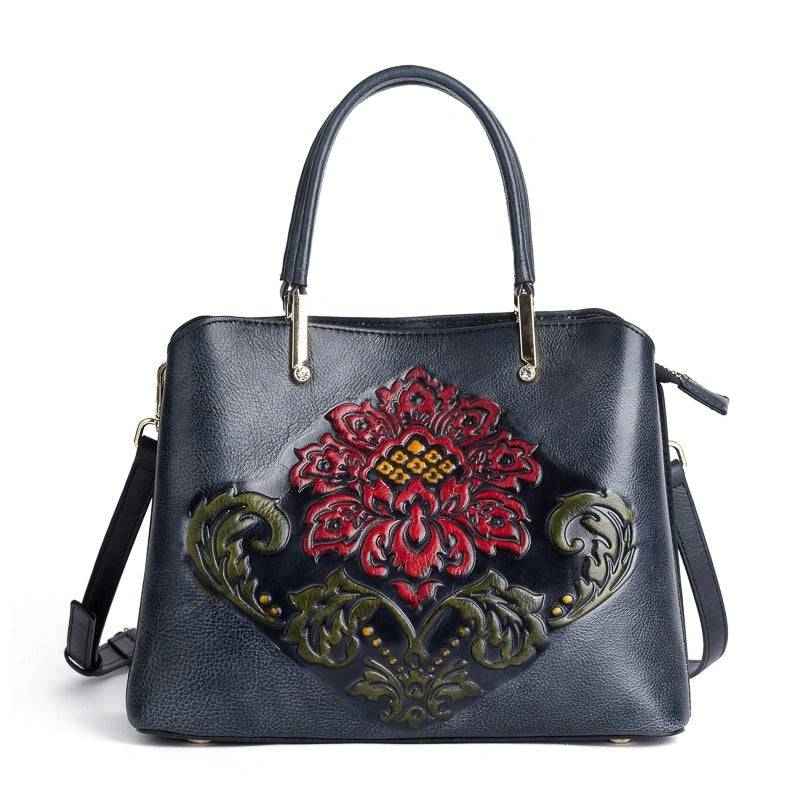 Rossie Viren women's leather handbag with top handle and shoulder strap, featuring a sleek crossbody design and stylish details.