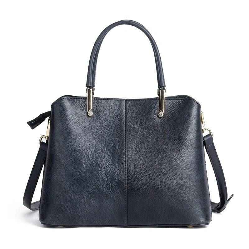 Rossie Viren women's leather handbag with top handle and shoulder strap, featuring a sleek crossbody design and elegant craftsmanship.