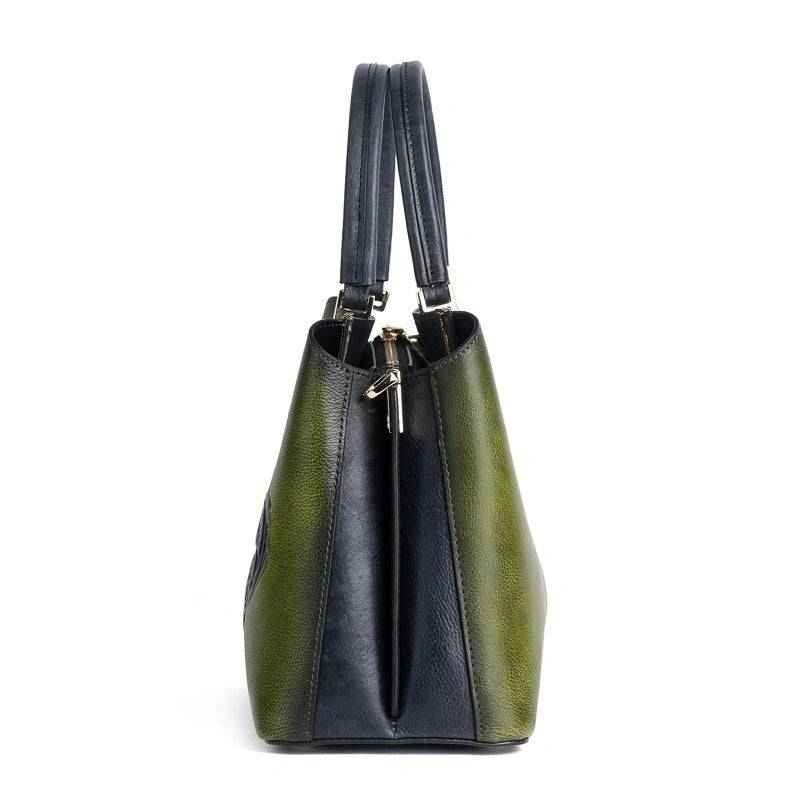 Rossie Viren women's leather handbag with top handle and shoulder strap, featuring a structured crossbody design.