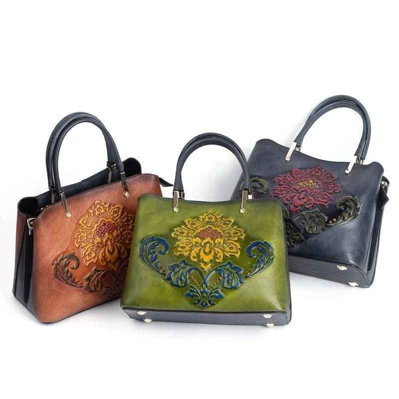 Rossie Viren women's leather top handle shoulder and crossbody handbag with sleek design and structured shape.