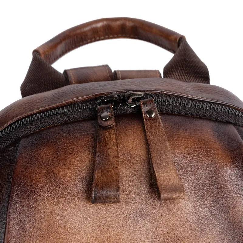 Rossie Viren women's retro genuine leather large backpack, leather rucksack and office bag with spacious design and sturdy straps.