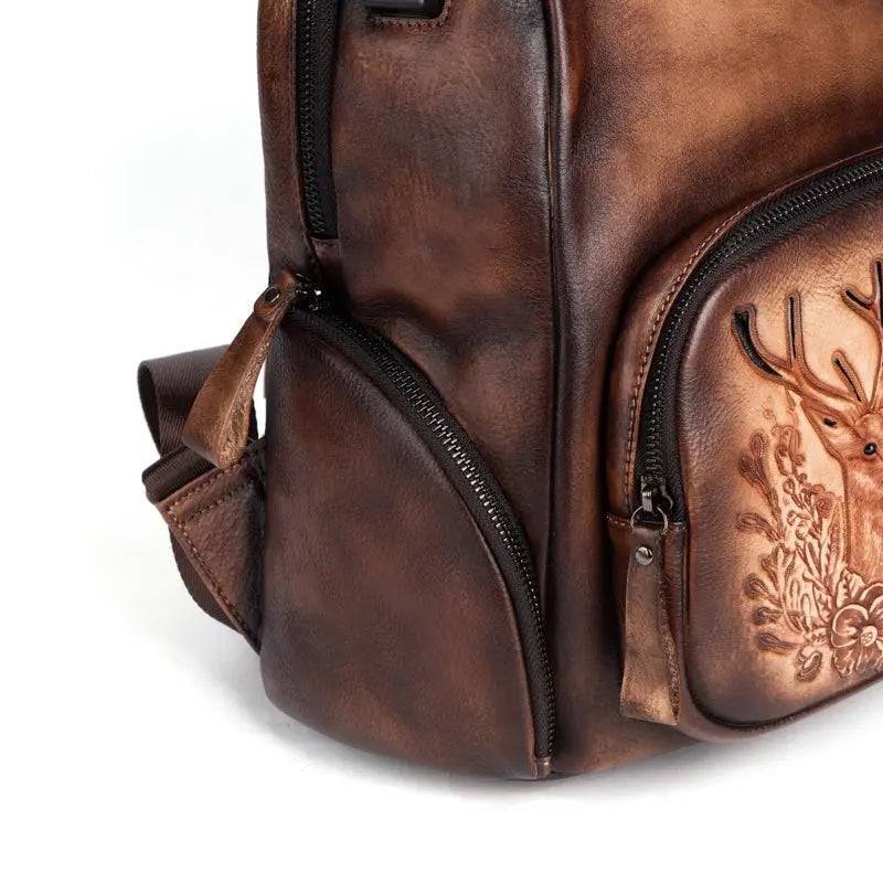 Rossie Viren women's retro genuine leather large backpack, leather rucksack with multiple compartments and sturdy straps.