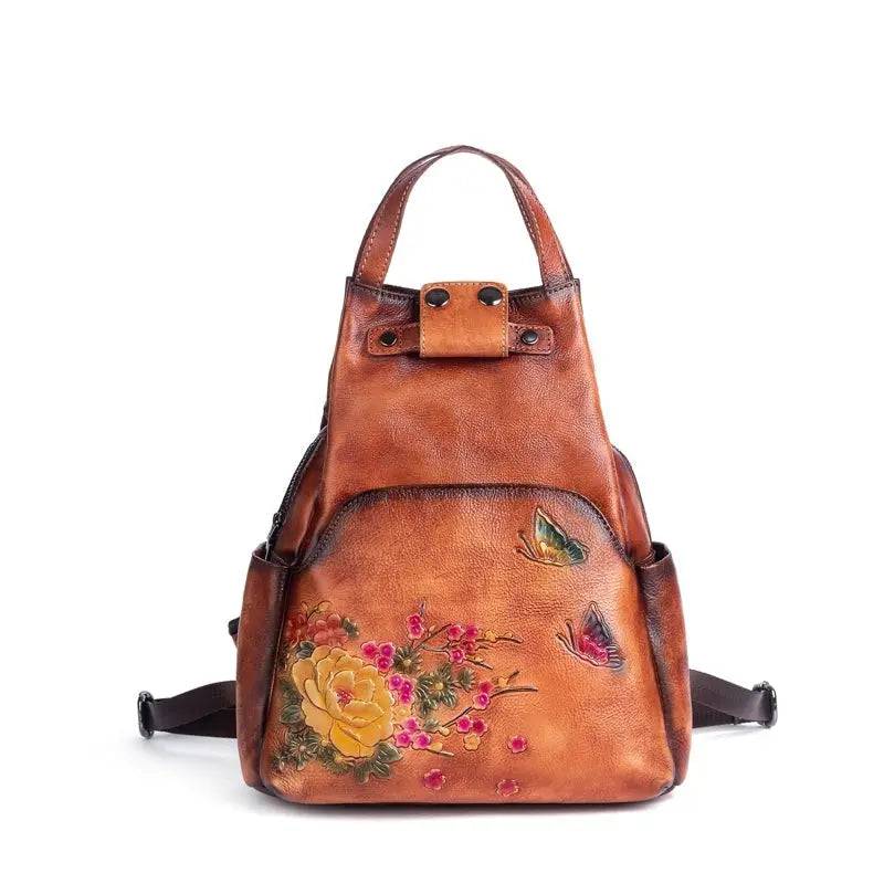 Rossie Viren women's vintage leather backpack with adjustable straps, top handle, and classic design for stylish everyday use.