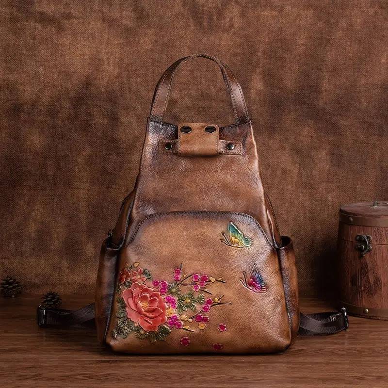 Rossie Viren women's vintage leather backpack with adjustable straps and multiple compartments, stylish leather rucksack for women.