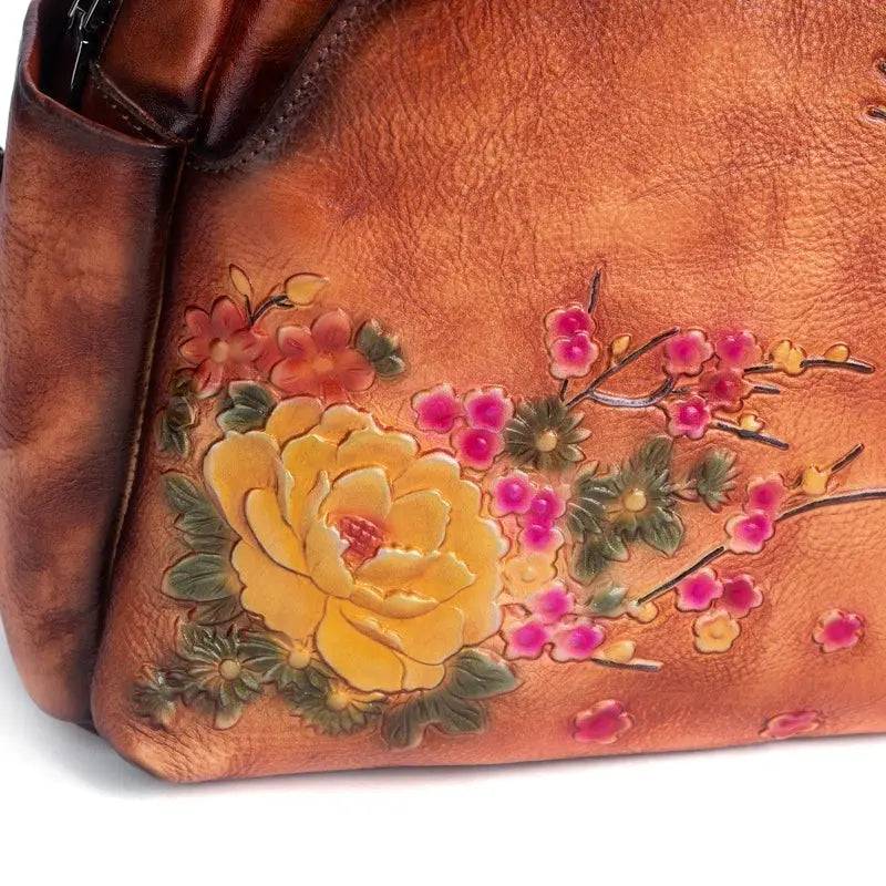 Rossie Viren women's vintage leather backpack featuring a classic leather rucksack design with adjustable straps.