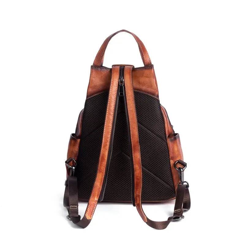 Rossie Viren vintage leather backpack, women's leather rucksack with adjustable straps and top handle, stylish and functional handbag.