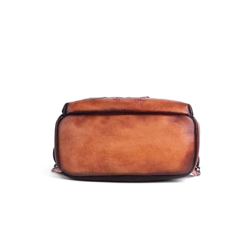 Rossie Viren women's vintage leather backpack with adjustable straps and classic rucksack design, ideal for stylish daily use.