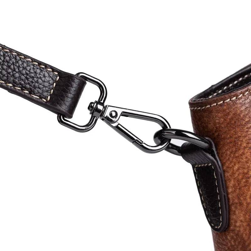 Rossie Viren genuine leather women's handbag with top handle, shoulder strap, and spacious tote design, ideal for work and casual use.