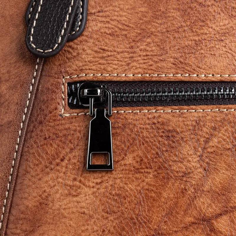 Rossie Viren genuine leather women's handbag with shoulder strap, tote style, top handle, perfect for work or casual use.