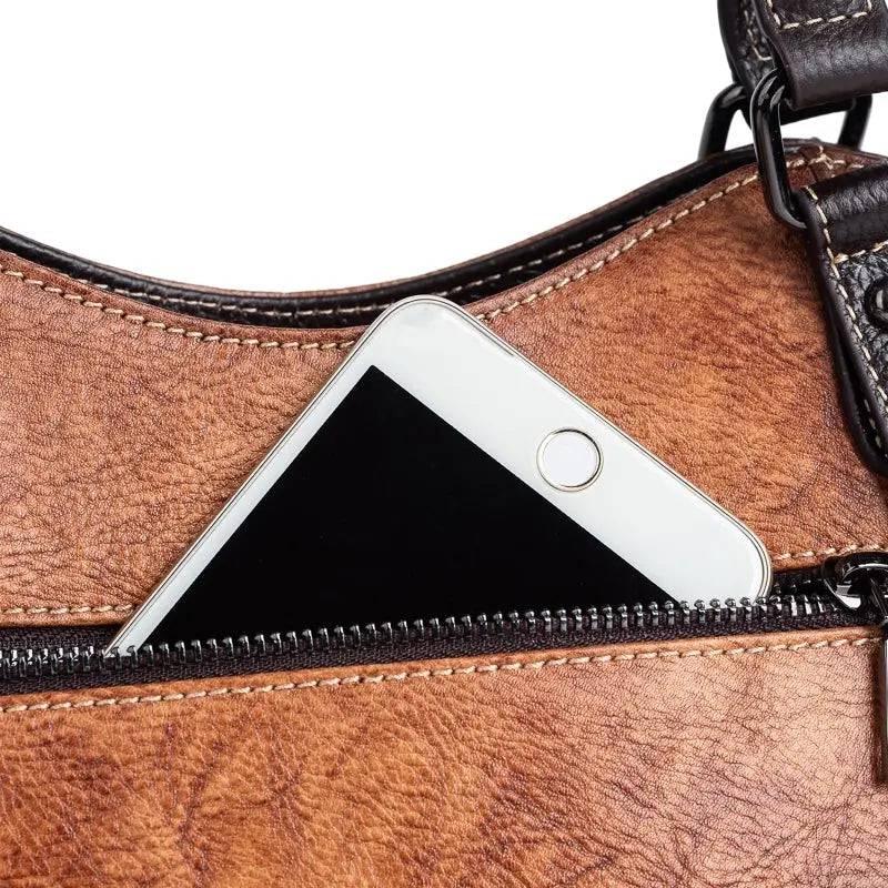 Rossie Viren women's genuine leather handbag with top handle, shoulder strap, and spacious work tote design.