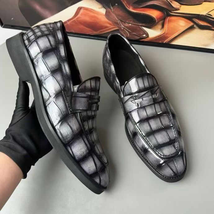 Vintage grey crocodile leather loafer shoes by Rossie Viren, showcasing elegant crocodile skin texture and classic slip-on design.