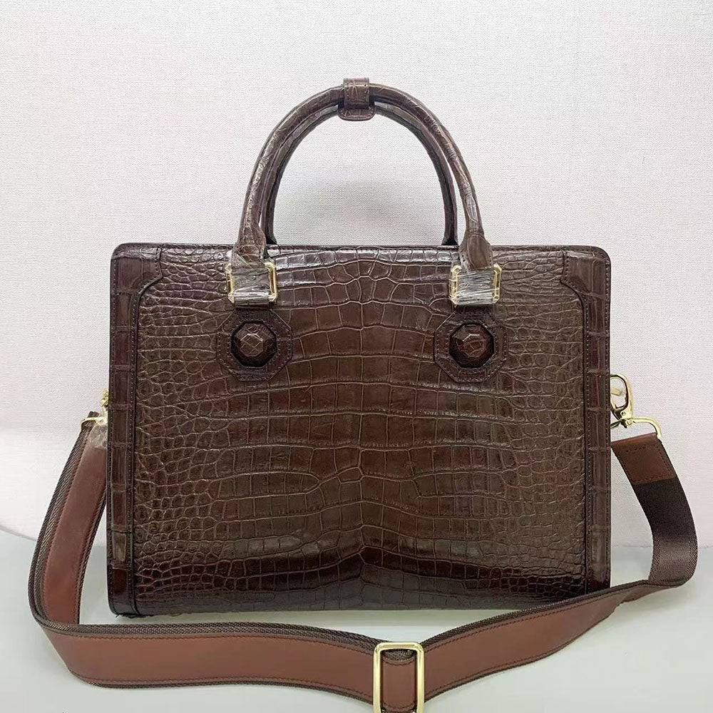 Rossie Viren crocodile skin briefcase with sleek leather design, featuring a sturdy handle and multiple compartments for business essentials.