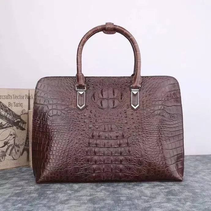 Rossie Viren shell handbag made of crocodile leather featuring a sleek Alma bag design with a shell pack style.