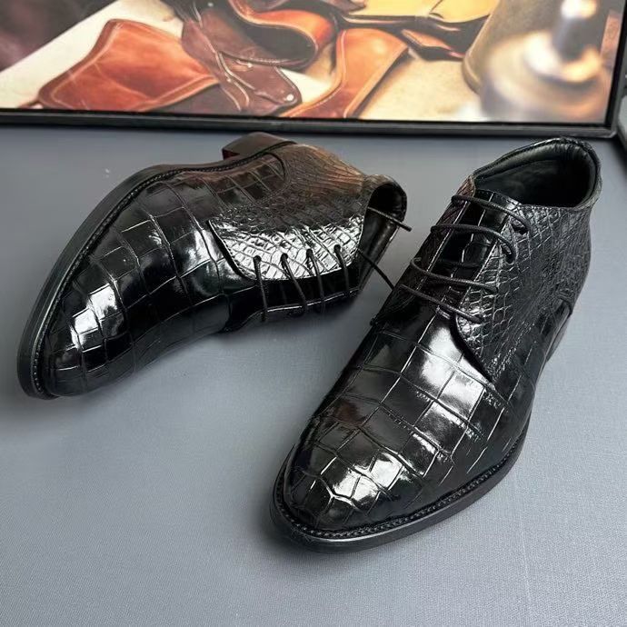 Black genuine crocodile leather boots by Rossie Viren, stylish crocodile skin shoes with detailed texture and sleek design.