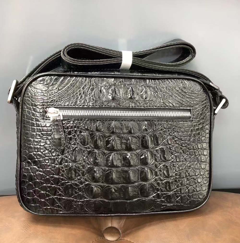 Rossie Viren crocodile leather cross body handbag with adjustable strap and sleek design.