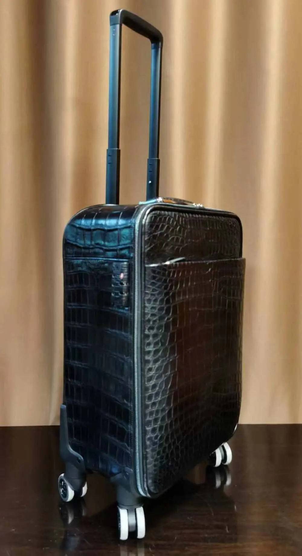 Rossie Viren crocodile skin leather 20-inch black travel suitcase with universal wheels and trolley handle.