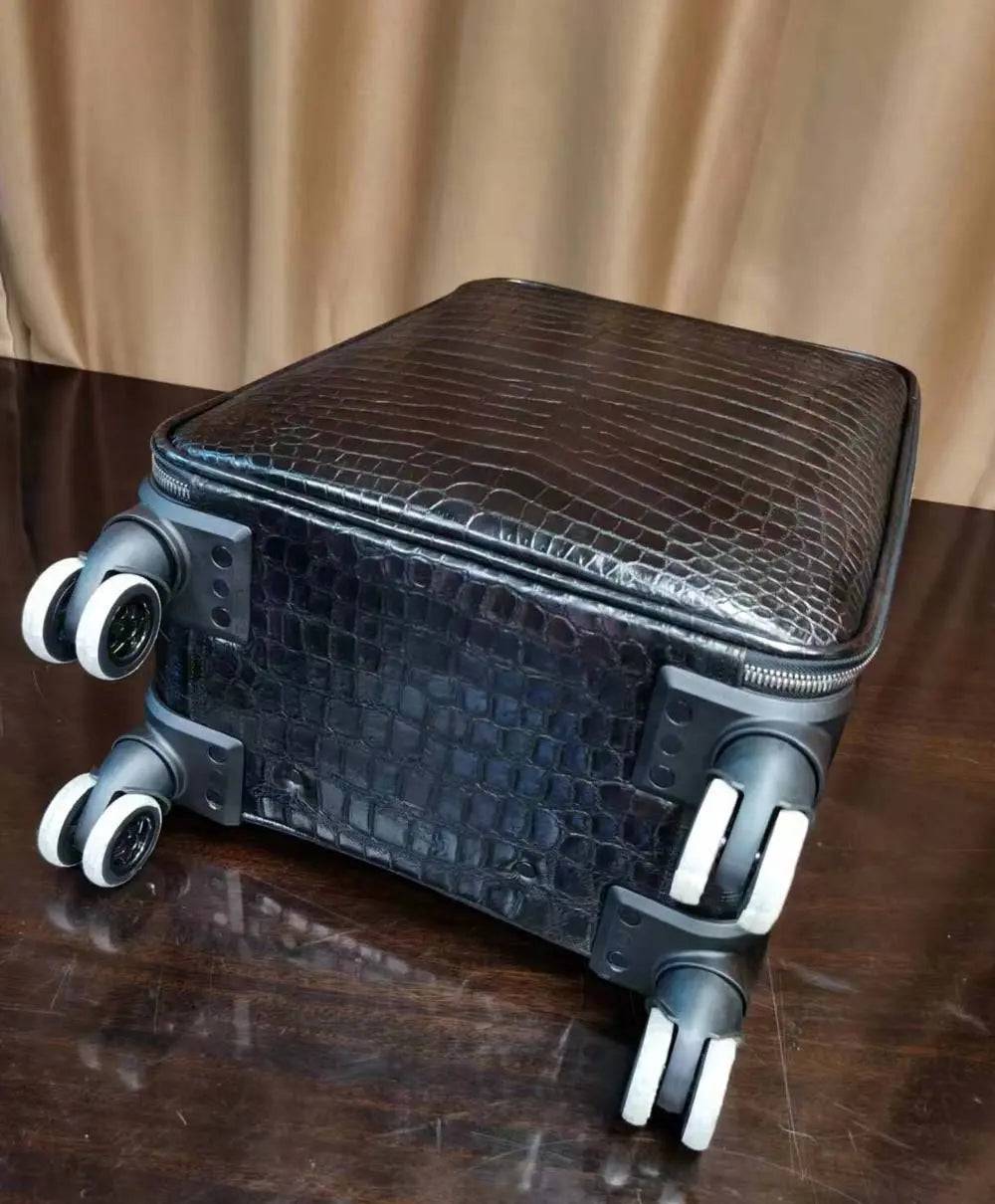 Black crocodile skin leather suitcase by Rossie Viren with universal wheels, 20-inch rollaboard travel bag and trolley case.