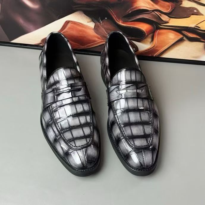 Vintage grey crocodile leather loafer shoes by Rossie Viren, showcasing a classic design with textured crocodile pattern.