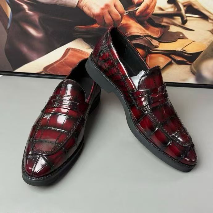 Vintage red crocodile leather loafer shoes by Rossie Viren, featuring textured crocodile pattern and classic slip-on design.