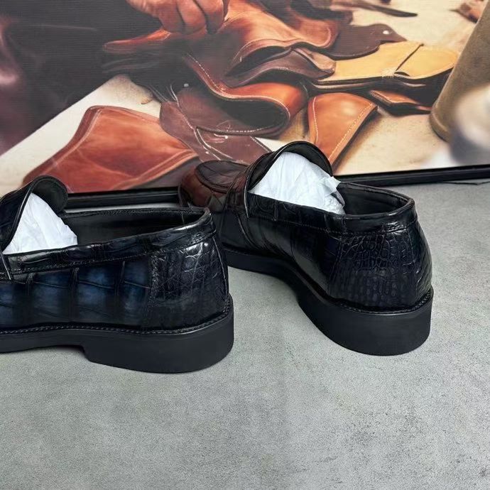 Dark grey vintage crocodile leather loafer shoes by Rossie Viren, showcasing detailed crocodile texture and classic slip-on design.