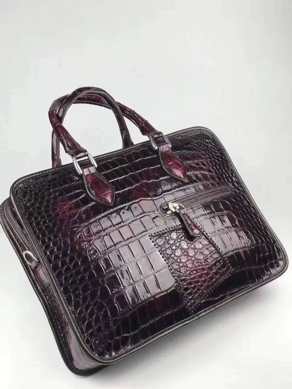 Vintage crocodile leather briefcase and business bag with top handles by Rossie Viren, showcasing a classic, textured leather design.
