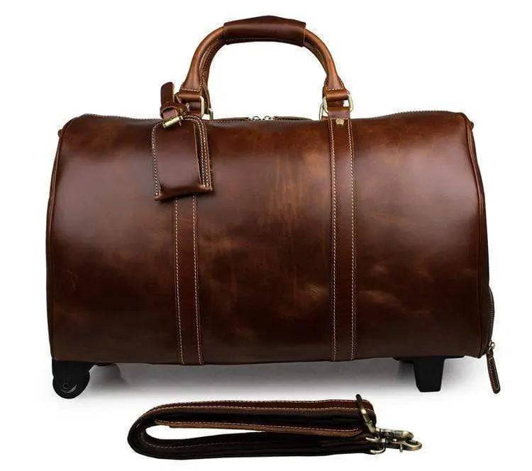 Vintage tan leather Rossie Viren carry-on luggage bag, handbag style with sturdy handle and classic design.