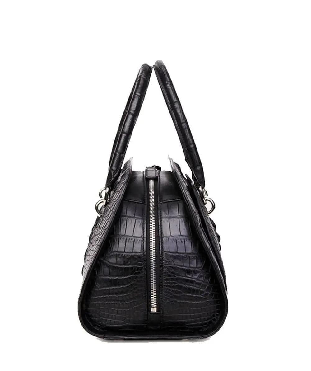 Women's crocodile leather dome satchel handbag by Rossie Viren, featuring a structured design with top handles and a sleek finish.