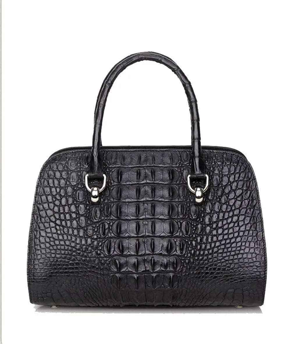 Women's crocodile leather dome satchel bag by Rossie Viren, featuring structured design and top handle in natural leather finish.