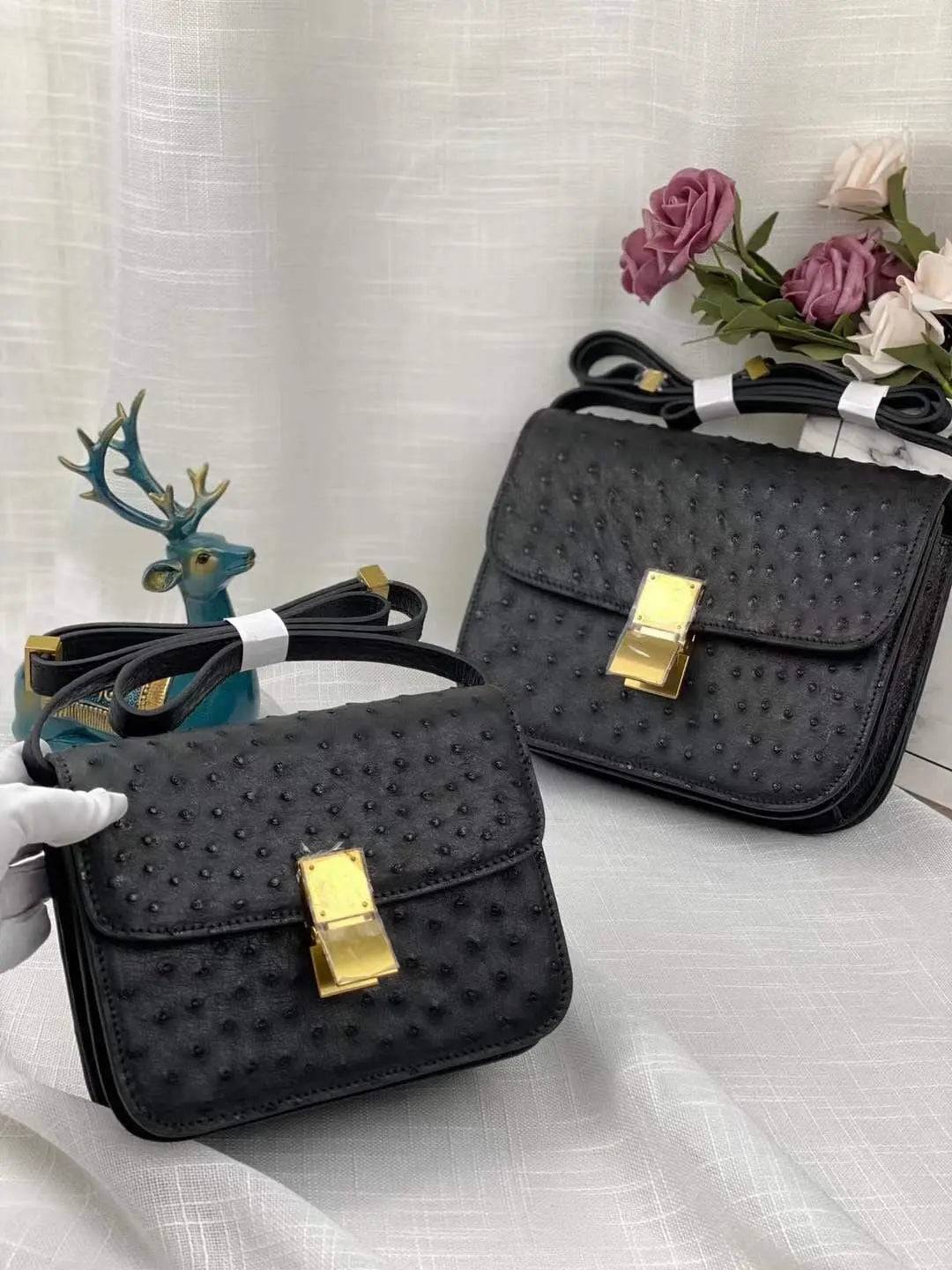 Women’s ostrich leather cross body handbag by Rossie Viren, featuring a sleek shoulder strap and textured ostrich pattern.