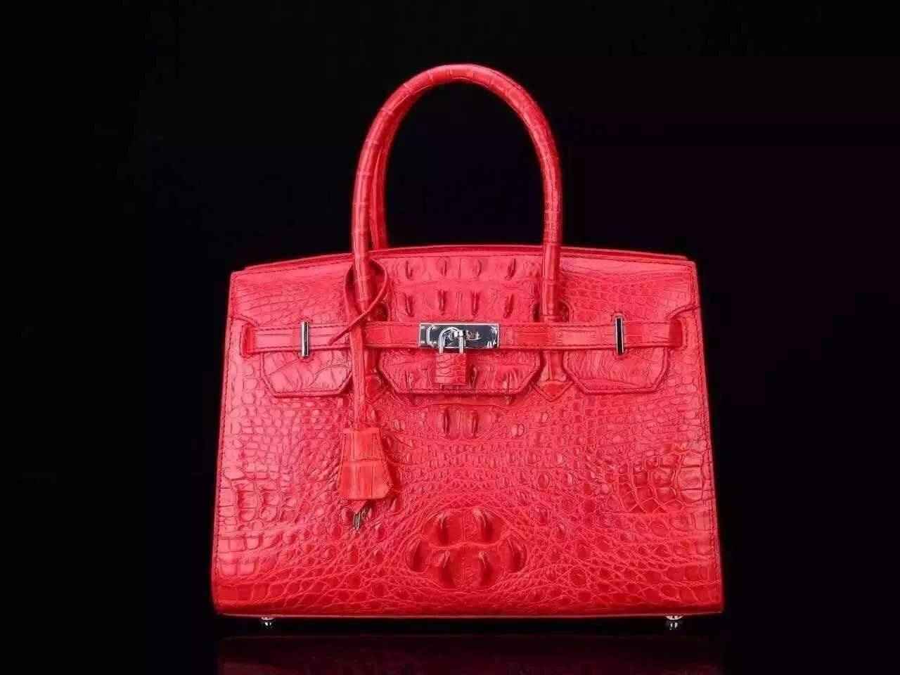 Women's genuine crocodile leather tote handbag with padlock closure by Rossie Viren, featuring a sleek and luxurious design.