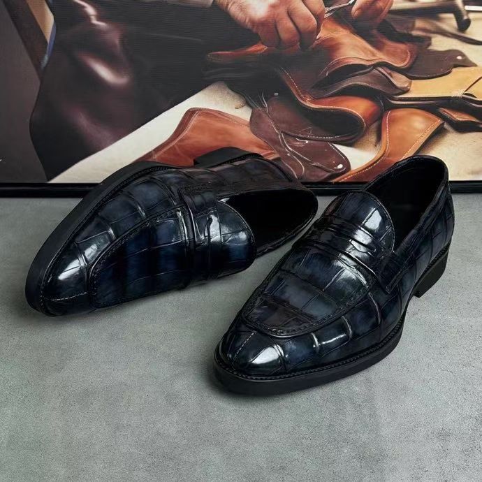 Vintage dark grey crocodile leather loafer shoes by Rossie Viren, featuring a sleek design and textured crocodile pattern.