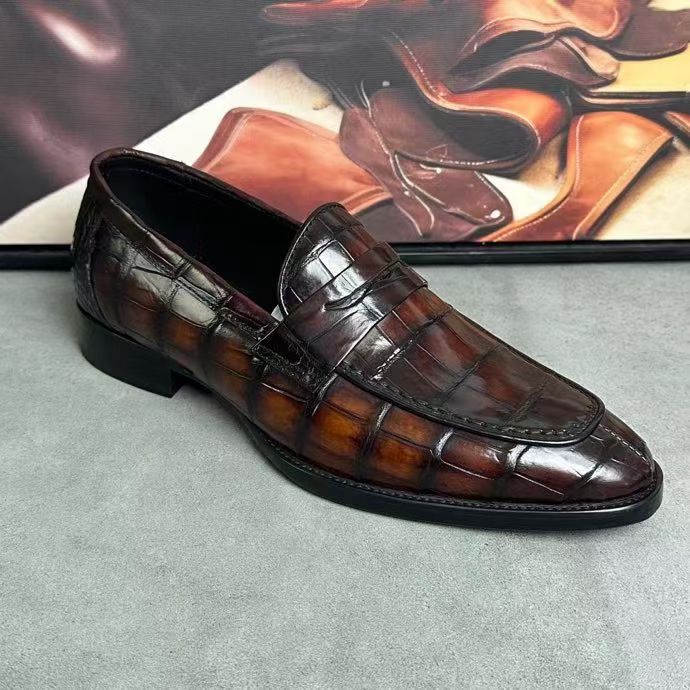 Vintage brown crocodile leather loafer shoes by Rossie Viren, showcasing detailed crocodile texture and classic slip-on style.