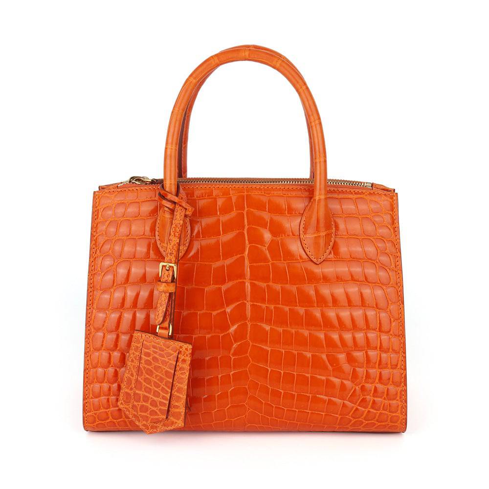 Beaded shiny crocodile skin leather crossbody handbag with top handle by Rossie Viren, stylish and elegant accessory.